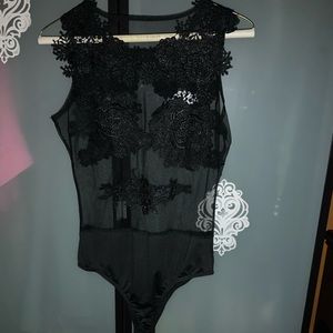 Black sheer and lace sexy bodysuit